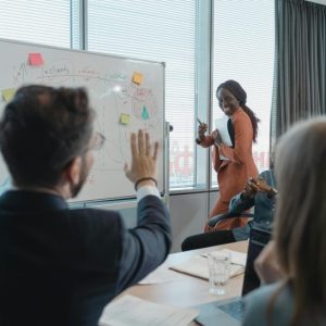 Team of professionals analyzing digital marketing results on screen in a remote work setting